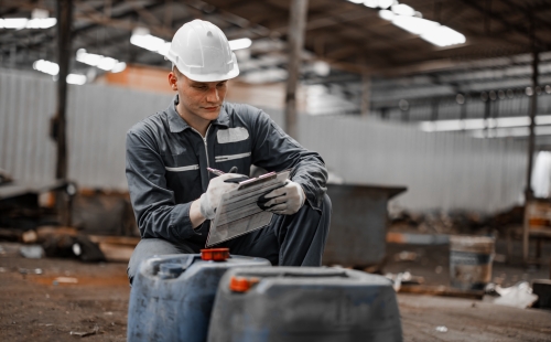 Industrial waste inspector at work 